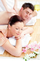 Young Caucasian Couple Receiving a Back Massage Wall Mural