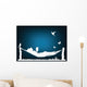 White silhouette of a woman reading in a hammock Wall Mural