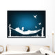 White silhouette of a woman reading in a hammock Wall Mural