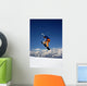 Snowboarder in Orange Jumping High Wall Mural