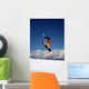 Snowboarder in Orange Jumping High Wall Mural