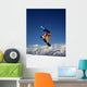 Snowboarder in Orange Jumping High Wall Mural