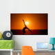 sunset silhouette gymnast on beach Wall Mural