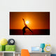 sunset silhouette gymnast on beach Wall Mural