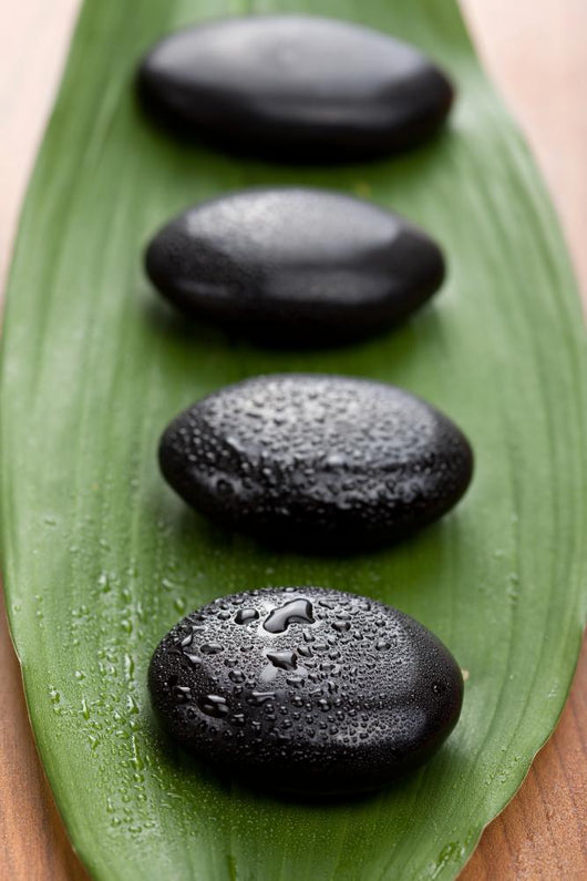 Black Spa Stones over Wall Mural