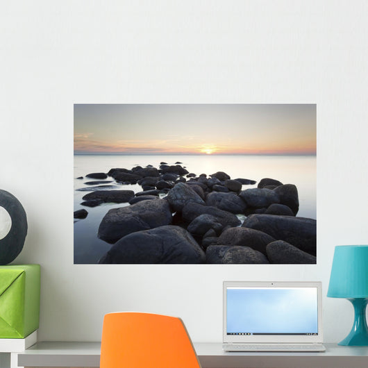 Rocks leading to open sea. Wide angle photo Wall Mural
