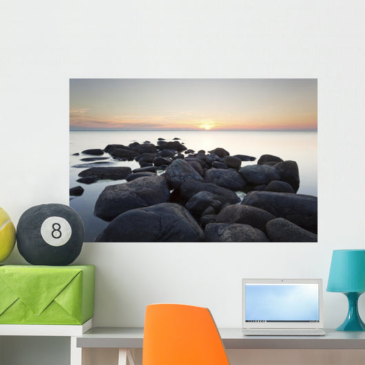 Rocks leading to open sea. Wide angle photo Wall Mural