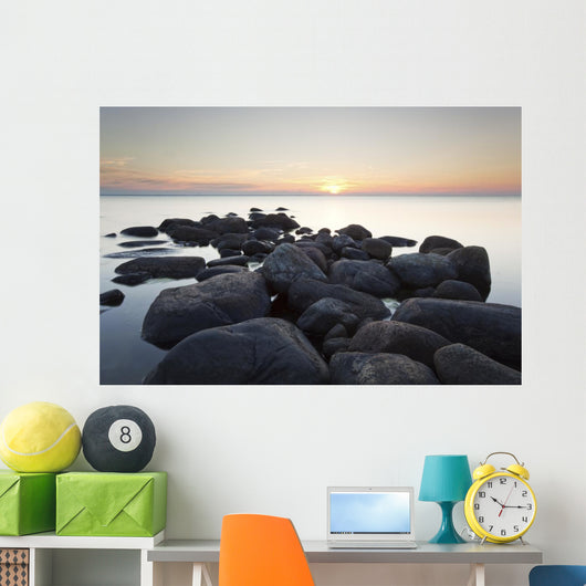Rocks leading to open sea. Wide angle photo Wall Mural