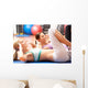 Women Doing Stretching Exercises In Gym Wall Mural