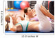 Women Doing Stretching Exercises In Gym Wall Mural
