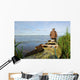 Hunter with his kayak Wall Mural