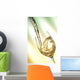 Pour white vine into glass with light background. Wall Mural