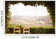 Vine Covered Patio and Chairs Overlooking the Country Wall Mural