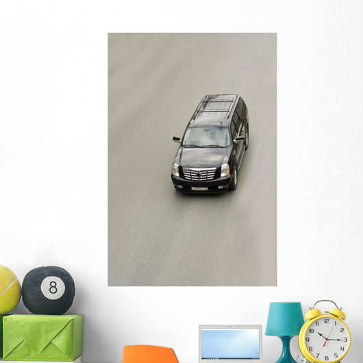 suv car cadillac escalade on the road Wall Mural