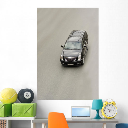 suv car cadillac escalade on the road Wall Mural