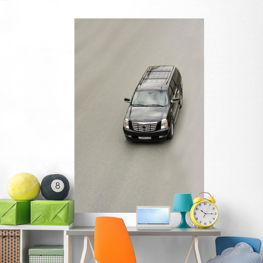 suv car cadillac escalade on the road Wall Mural