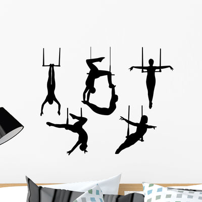 Trapeze Silhouette Vector Wall Decal shown on a wall