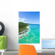 Aerial view of tropical island, clear blue water and coral reef Wall Mural