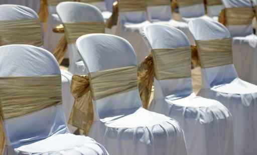White Chairs with Gold Wall Decal