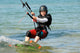Kitesurfing with a smile Wall Mural