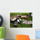 Picnic scene: wine bottles, glass, bread, boxes, still life Wall Mural