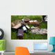 Picnic scene: wine bottles, glass, bread, boxes, still life Wall Mural
