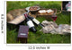 Picnic scene: wine bottles, glass, bread, boxes, still life Wall Mural
