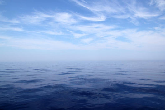 Calm sea blue water ocean sky horizon scenics Wall Mural