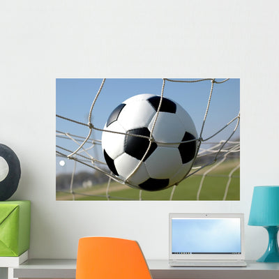 Soccer Score Wall Mural shown on a wall