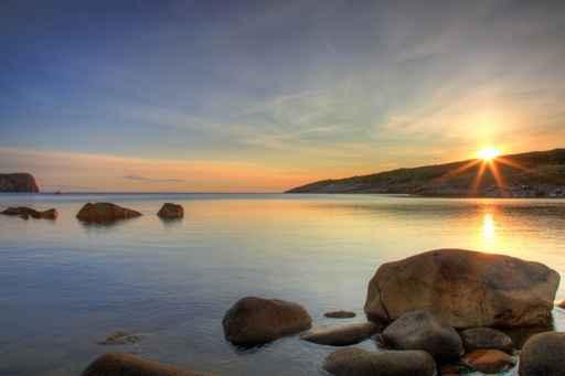 Sunrise along Rocky Shoreline Wall Decal
