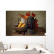 Autumn still life with kerosene lamp and corn in wicker basket Wall Mural