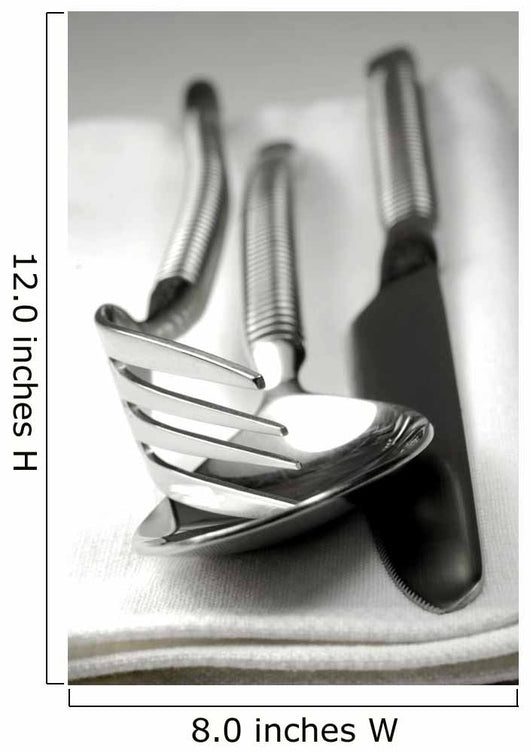 Cutlery resting on a white napkin Wall Mural