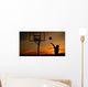 Silhouette of Teen Boy shooting a Basketball Wall Mural