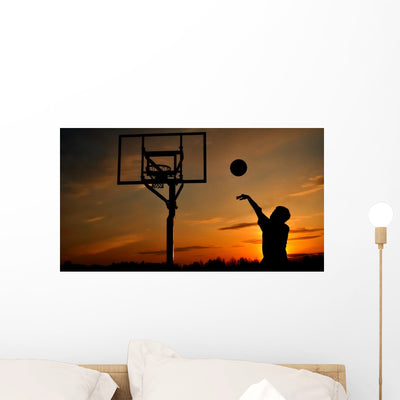 Silhouette Teen Boy Shooting Wall Mural shown on a wall
