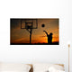 Silhouette of Teen Boy shooting a Basketball Wall Mural