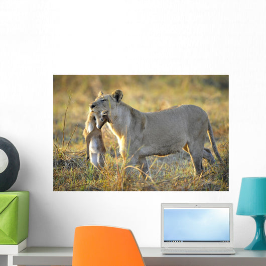 Lioness with Prey Wall Mural