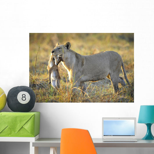 Lioness with Prey Wall Mural