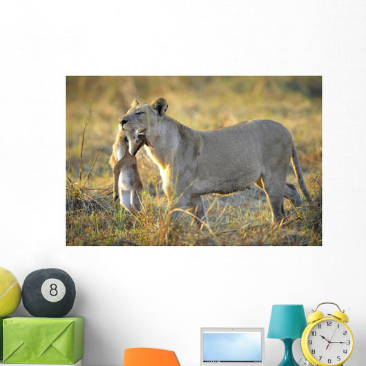 Lioness with Prey Wall Mural