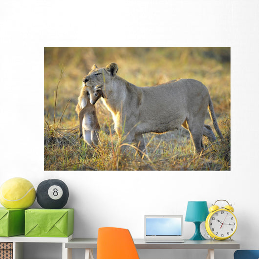 Lioness with Prey Wall Mural