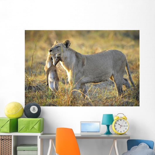 Lioness with Prey Wall Mural