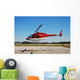 Red Helicopter Hovering above