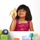 Young Girl Eating Banana Wall Decal