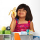 Young Girl Eating Banana Wall Decal