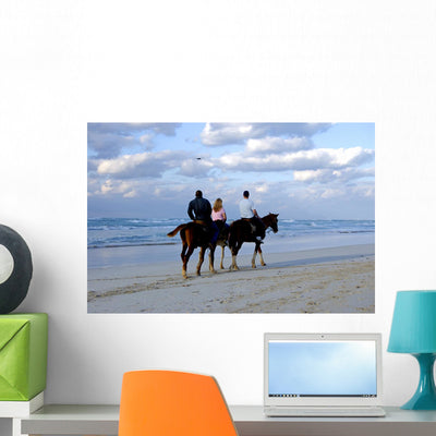 Horses Tropical Beach Wall Mural shown on a wall