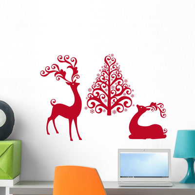 Reindeer with Christmas Tree Wall Decal shown on a wall