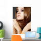 Hairstyle. Beautiful model with long shiny hair Wall Mural