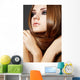 Hairstyle. Beautiful model with long shiny hair Wall Mural