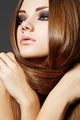 Hairstyle. Beautiful model with long shiny hair Wall Mural