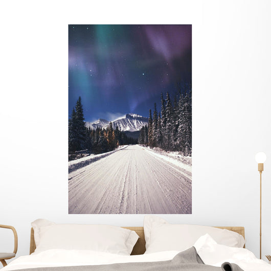 Northern Lights Over A Snowy Road Wall Mural