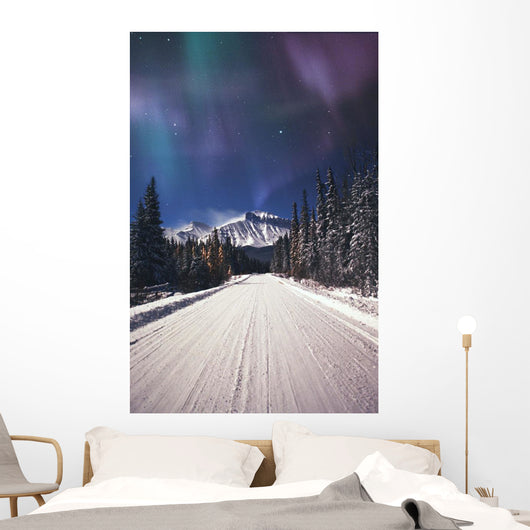 Northern Lights Over A Snowy Road Wall Mural